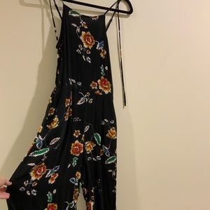 Black romper with flower print design